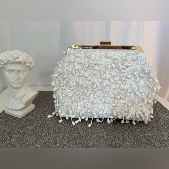 Brand new. Perry white beautiful clutch crossbody bag